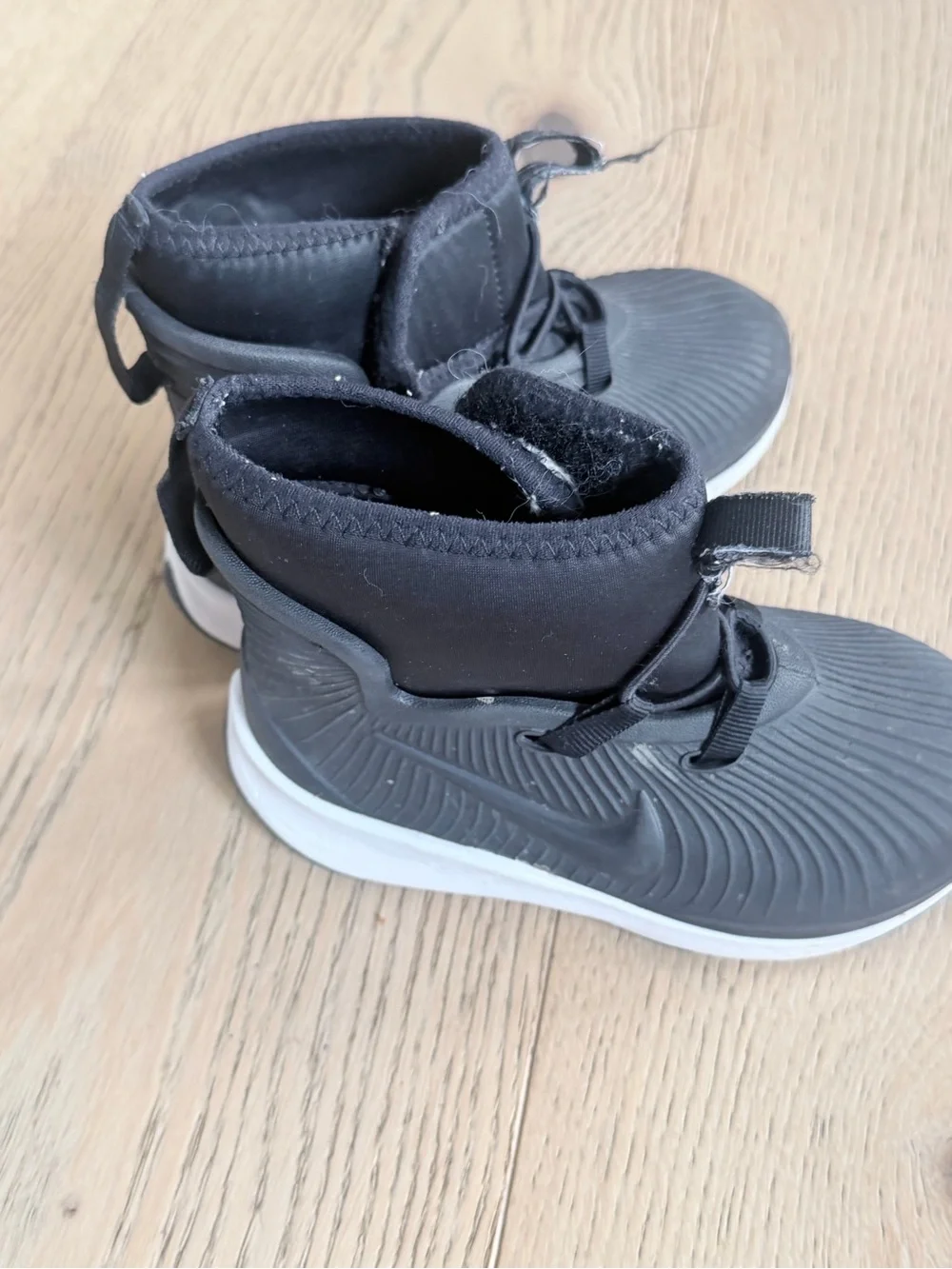 Kids Black Nike snow rain boot